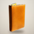 Amber tan / white thread, black edges